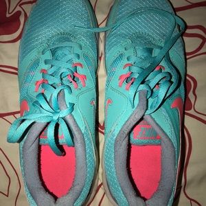 Teal/Pink Nike tennis shoes size 10